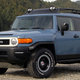 A photo of a blue Toyota FJ Cruiser SUV.
